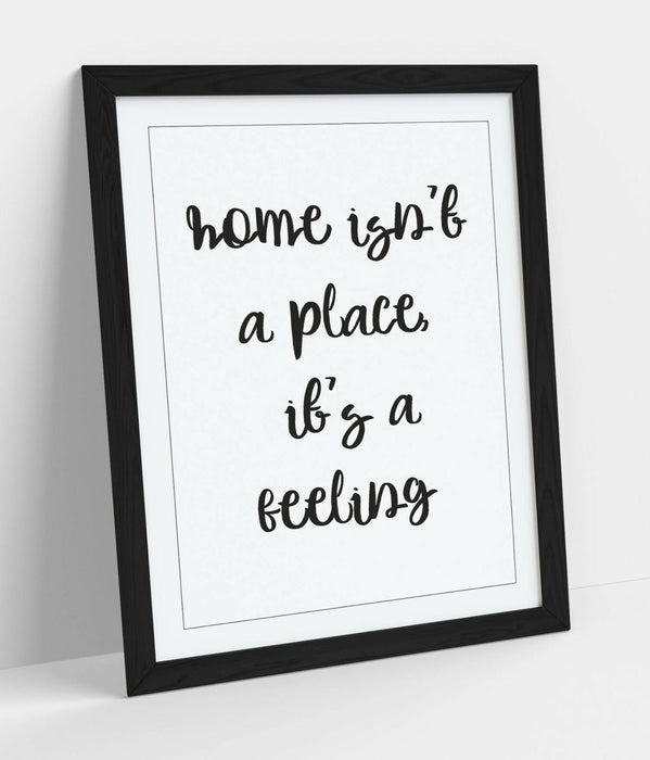 "HOME ISN'T A PLACE IT'S A FEELING" QUOTE SLOGAN -FRAMED WALL ART PICTURE PRINT