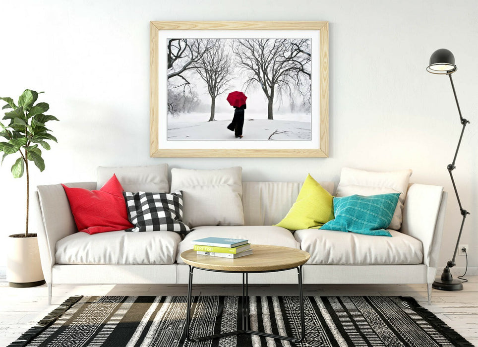 Framed Art Print - Red Umbrella Artwork | Snow Scene Print With Wood Grain Frame