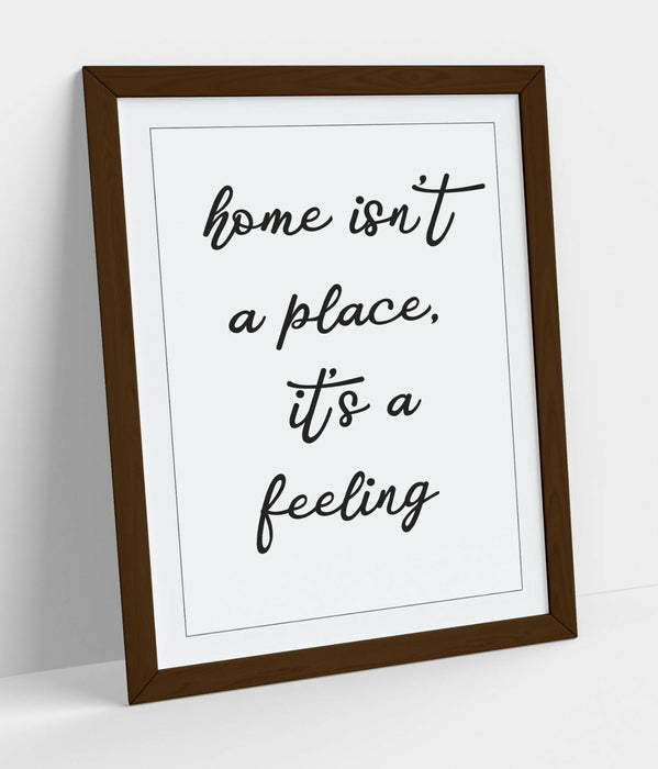 "HOME ISN'T A PLACE IT'S A FEELING" QUOTE SLOGAN -FRAMED WALL ART PICTURE PRINT