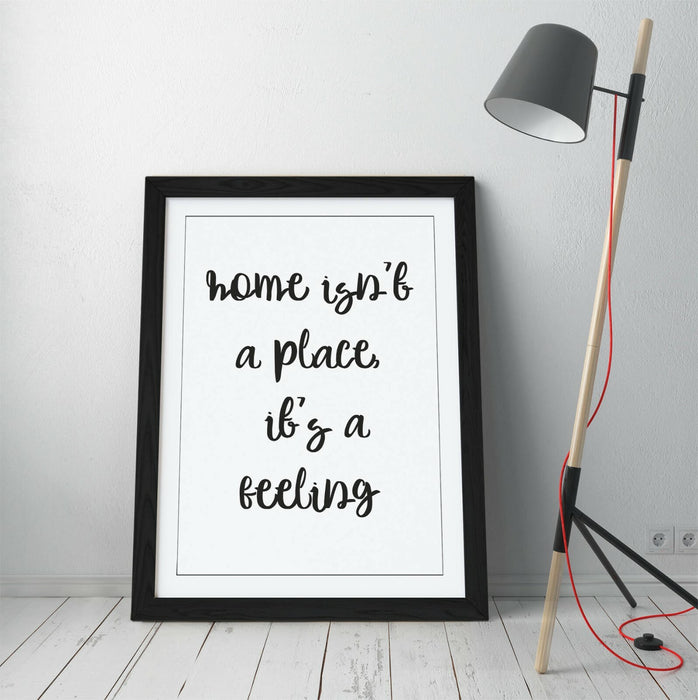 "HOME ISN'T A PLACE IT'S A FEELING" QUOTE SLOGAN -FRAMED WALL ART PICTURE PRINT