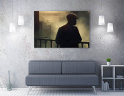 Silhouette of a person against a wall with a modern interior setting