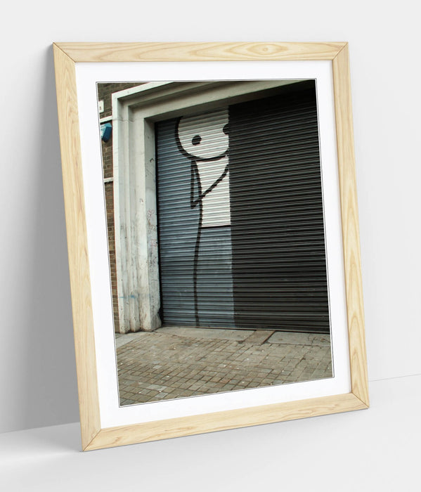 Framed Wall Art – Stik Hiding Stick Man Poster | Urban Street Art Decor