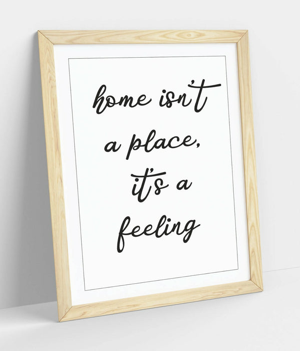 "HOME ISN'T A PLACE IT'S A FEELING" QUOTE SLOGAN -FRAMED WALL ART PICTURE PRINT