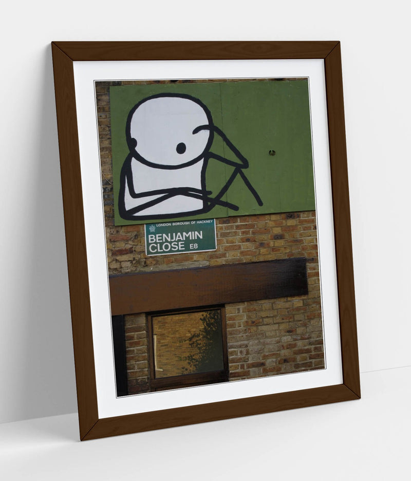 Framed Wall Art – STIK Stick Man Sitting Graffiti Print on Matte Paper
