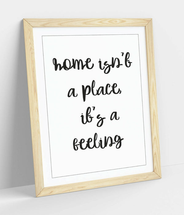 "HOME ISN'T A PLACE IT'S A FEELING" QUOTE SLOGAN -FRAMED WALL ART PICTURE PRINT